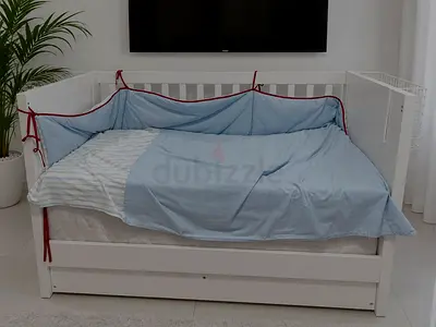 IKEA cot with 2 mattresses and drawers