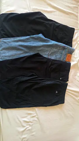Lot of 4 men's bottoms: jeans, chinos and track pants - good used condition