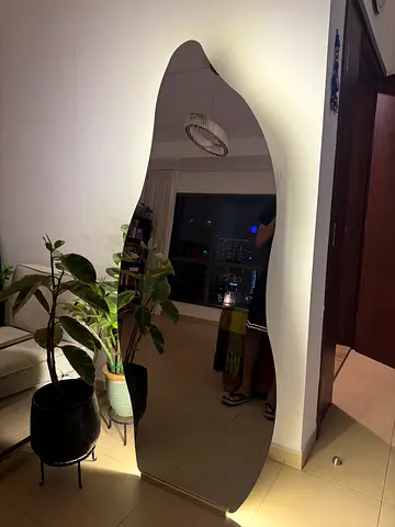 Full-length decorative wall mirror with curve