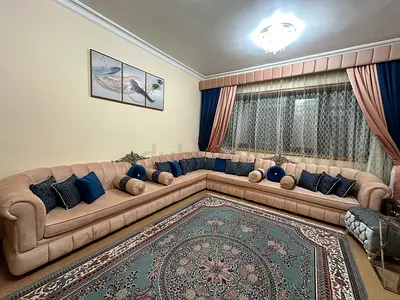Elegant U-Shaped Sectional Sofa with Cushions