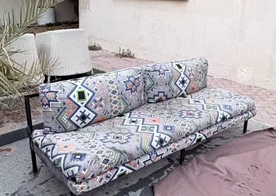 3-seater outdoor sofa with patterned cushions - good condition 3 pcs available with leather covers