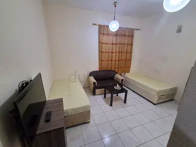 AVAILABLE COSY AND FURNISHED ROOM FOR BACHELORS(1 or2 MEN) LOCATED IN AL MUTEENA BACKSIE AVANI HOTEL