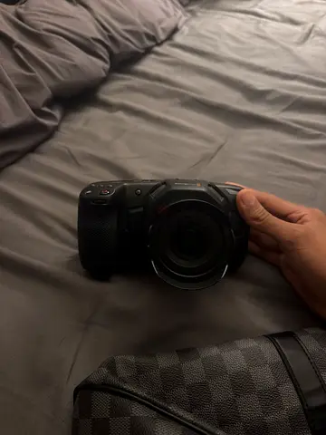 Black Magic Pocket Cinema 4k lens included