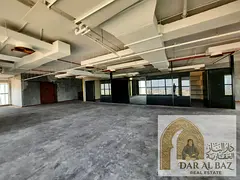 Fully equipped, high-end commercial office in Al Majaz 1 | 3,107 sq. ft. with an open sea view | Kit