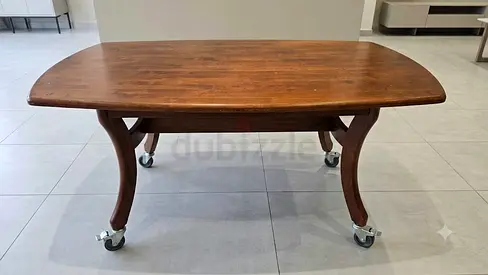Solid wood dining table on wheels