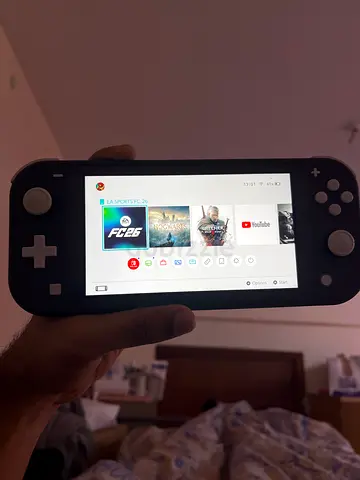 Used Nintendo Switch Lite handheld console - Grey, good condition