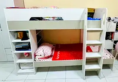 White wooden bunk bed with built-in shelves and storage (good condition)