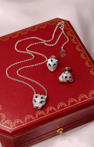 Cartier  PANTHERE DE' CARTIER PENDANT & EARRiNGS with Stones