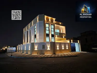 Corner villa for sale in Ajman, Al Yasmeen area: 5 bedrooms, majlis, living room, and maid's room. Freehold ownership for all nationalities; price inc