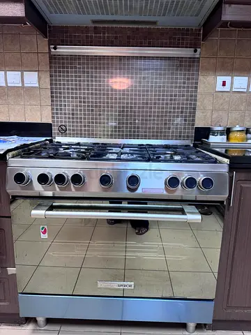 Stainless Steel 5-Burner Gas Cooker with Oven Technogas make - Good Working Condition