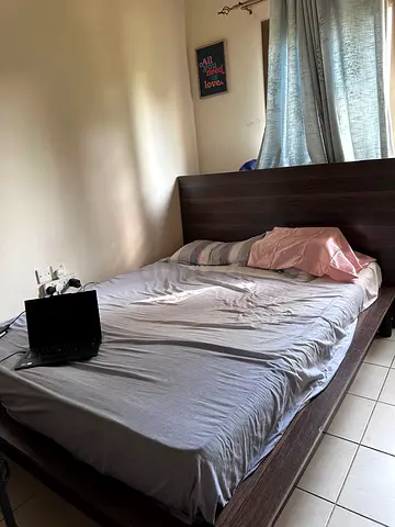 Dark wood queen bed frame with headboard along with mattress – good condition