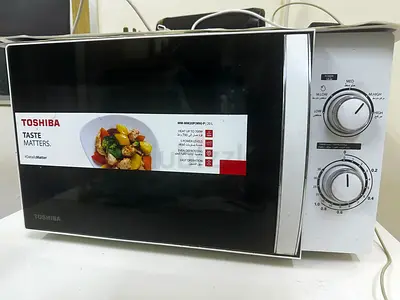 Toshiba Microwave Oven - Compact Manual Dial Model