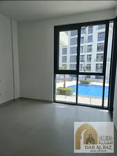First-time occupancy: 2-bedroom apartment with a living room in the prime location of Al Hamriyah, S