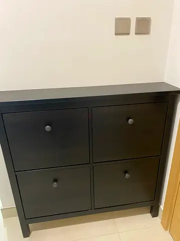 Dark wood 4-door storage cabinet - compact shoe/entry organizer