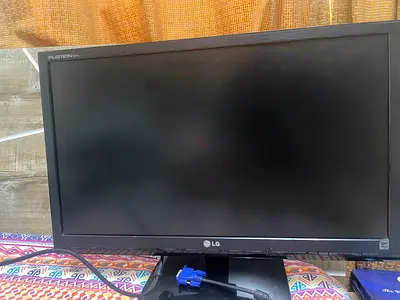 Urgent sale. LG Flatron E2441T-BN 24-inch monitor in good working condition.