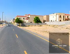 Residential and commercial lot with corner villas on Waska Street (G+1), directly on Al-Tala Street,