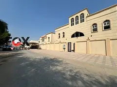 New Villa for Sale in Al Mowaihat 3 – Two-Street Corner | 12 Master Bedrooms | 4 Living Areas