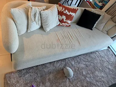 Light beige 3-seater sofa with cushions — good condition