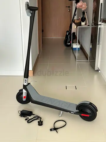 UNAGI Model One E-scooter — Dual Motor One Click Folding — Excellent Condition with Charger and Lock