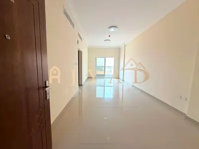Annual rent: 1BR + living room in Al Jurf 3, Ajman. Brand new, 2 baths, balcony, central AC, wardrobes, spacious, easy payment, near E311.