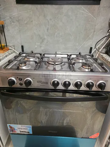 Used stainless steel 5-burner gas hob with oven control - good condition
