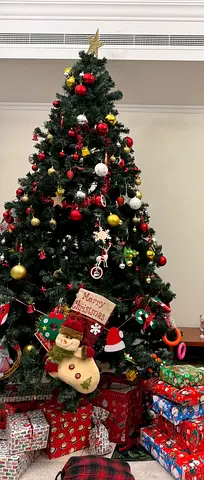 Decorated Artificial Christmas Tree with Ornaments and Gifts