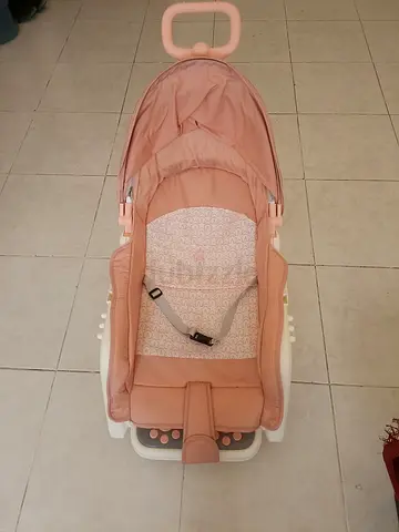 Light pink baby rocker/bouncer with canopy and harness - good condition