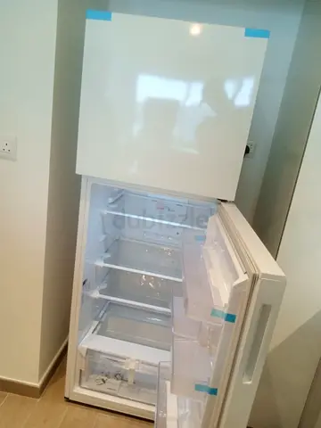 White top-freezer refrigerator - good working condition