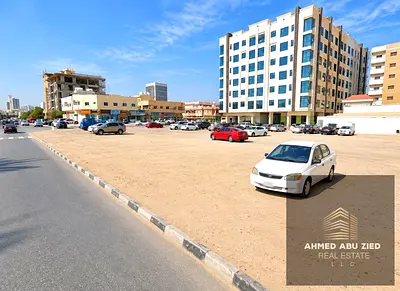 Residential and commercial land in Al-Rawda 3, on the corner of Street & Seka (G+4), freehold