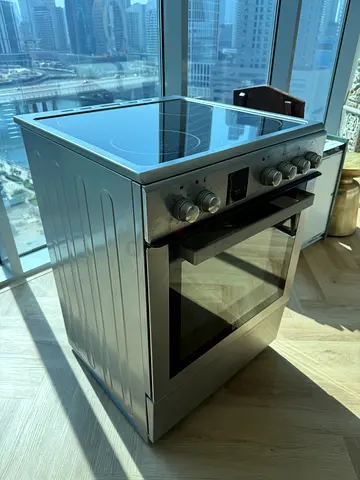 Used freestanding electric range with glass-ceramic hob and oven - good condition