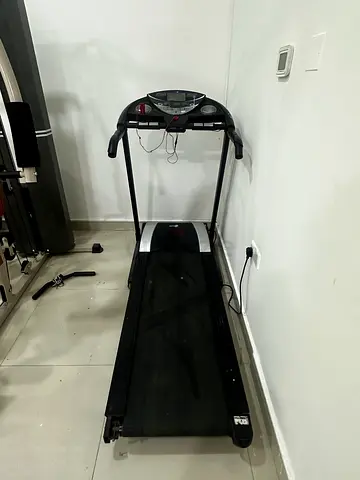 Used home Gym set motorized home treadmill workout machine and rowing equipm- good working condition