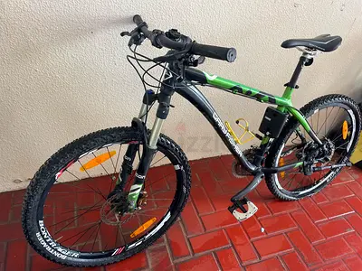 Gary Fisher green/black hardtail mountain bike - 26" wheels, front suspension