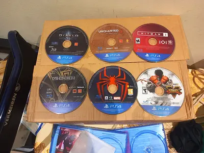 Bundle of 6 PS4 games (Diablo, Uncharted, Hitman, Dishonored 2, Spider-Man, Street Fighter V)