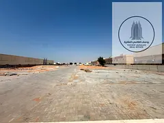 Large Open Yard for Rent in Sajaa Industrial Area – 107,450 sq. ft. | 30 kW Power | 5 Worker Rooms