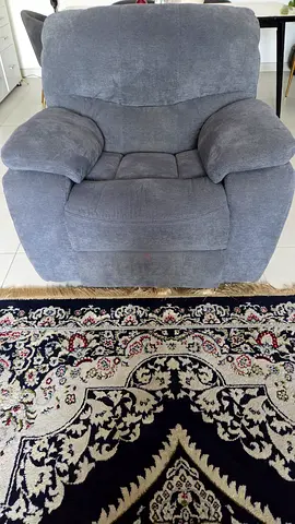 Comfortable single grey recliner armchair from homecenter  in good condition