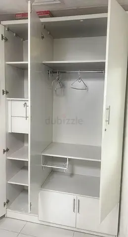 White 3-Door Wardrobe with Shelves and Hanging Rail - Good Condition