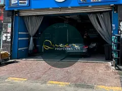 Car wash for sale in Ajman Al Rashidiya 1 inside a busy residential complex 89 sqm ready for immedia