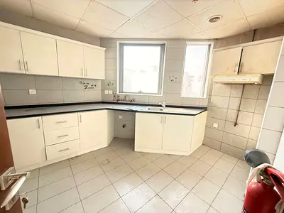 NO DEPOSIT CASH 1BHK LIKE BRAND NEW BUILDING IN MUWAILEH