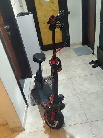 Electric scooter Modded Fast Used.with seat and safety jacket