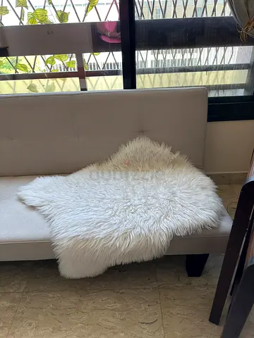 Faux sheepskin rug in white