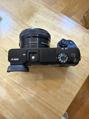 Sony Alpha 6000 mirrorless camera with 16-50mm kit lens - good condition