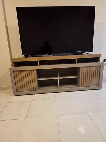 65-inch Smart LED TV in Good Working Condition ( including Table)