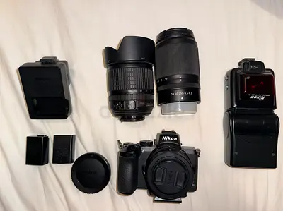 Nikon Z50 Mirrorless Camera Bundle with Lenses and Flash