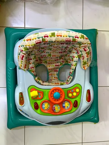 Used baby walker with activity tray - good condition