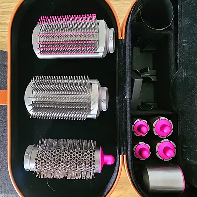 Dyson Airwrap styling set — multiple brush and barrel attachments (used)