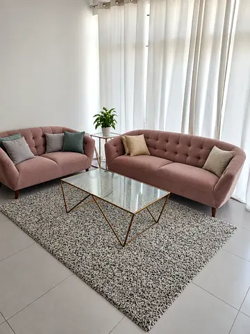 Pair of pink tufted sofas (2-seater and 3-seater) in excellent condition