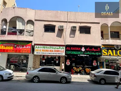 Prime Ground-Floor Commercial & Residential Building for Sale in Al Rumaila, Ajman | Steps from the Beach | Income AED 200,000 | Asking AED 3M