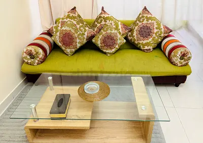 Green Fabric 5 seater Sofa with Decorative Cushions