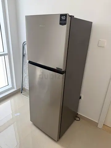 Silver two-door fridge, top freezer - good condition