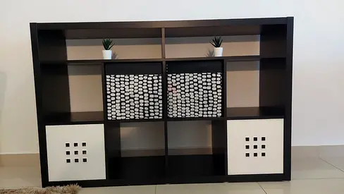 Dark brown 8-cubby bookshelf/storage unit with sliding doors